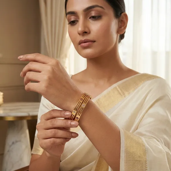 Daily_Wear_Gold-Plated_Brass_Bangles_with_Sleek_Cutouts_and_Stone_Flowers_(Set_of_2)