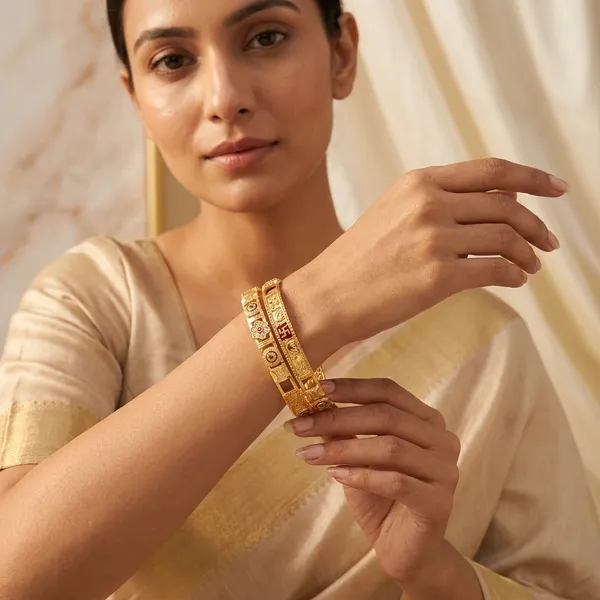 Daily_Wear_Gold-Plated_Brass_Bangles_with_Floral_and_Traditional_Motifs_(Set_of_2)
