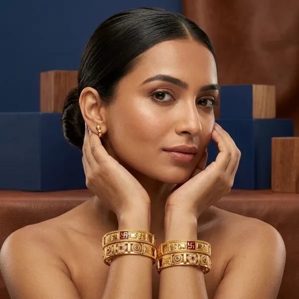 Daily_Wear_Gold-Plated_Brass_Bangles_with_Floral_and_Traditional_Motifs_(Set_of_2)