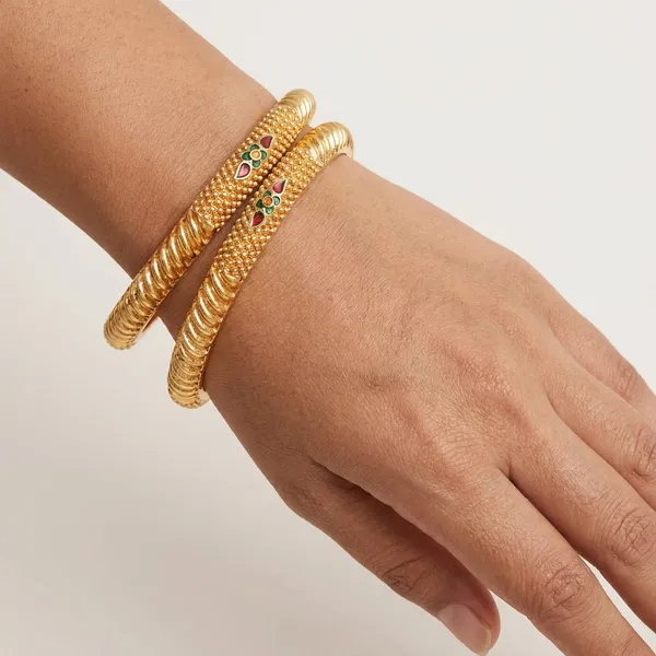 Set_of_2_Gold-Plated_Traditional_Bangles_with_Intricate_Beaded_Texture_and_Ruby-Green_Enamel_Accents