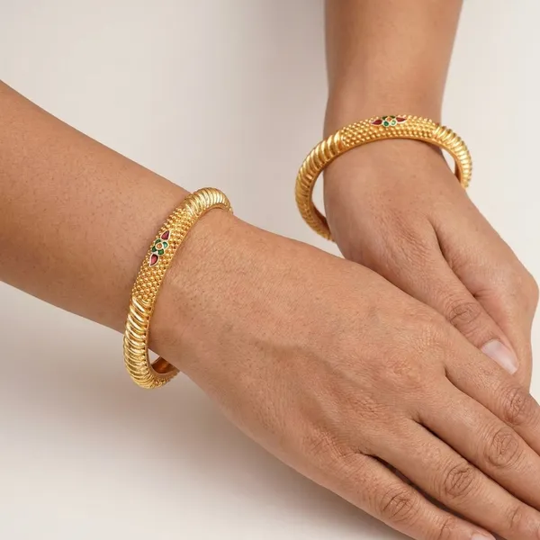 Set_of_2_Gold-Plated_Traditional_Bangles_with_Intricate_Beaded_Texture_and_Ruby-Green_Enamel_Accents