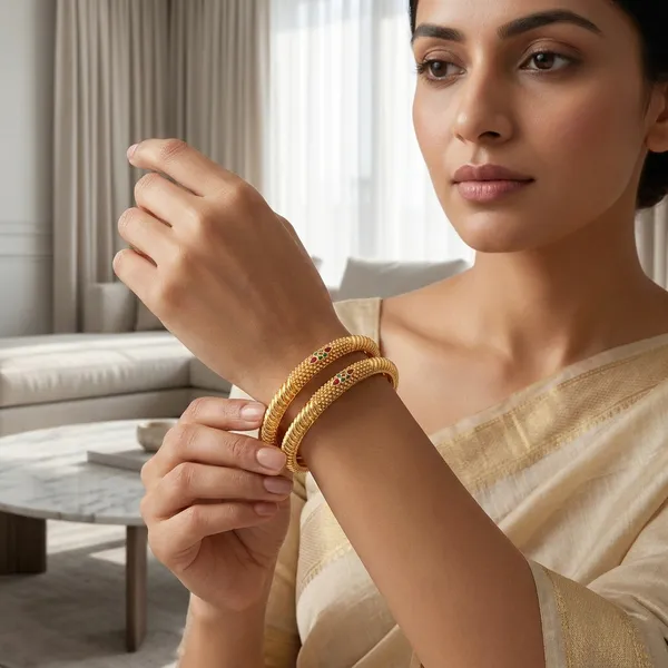 Set_of_2_Gold-Plated_Traditional_Bangles_with_Intricate_Beaded_Texture_and_Ruby-Green_Enamel_Accents