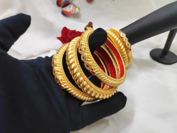 The Varsha Gram Gold-Plated Brass Rajasthani Bangles Set Of