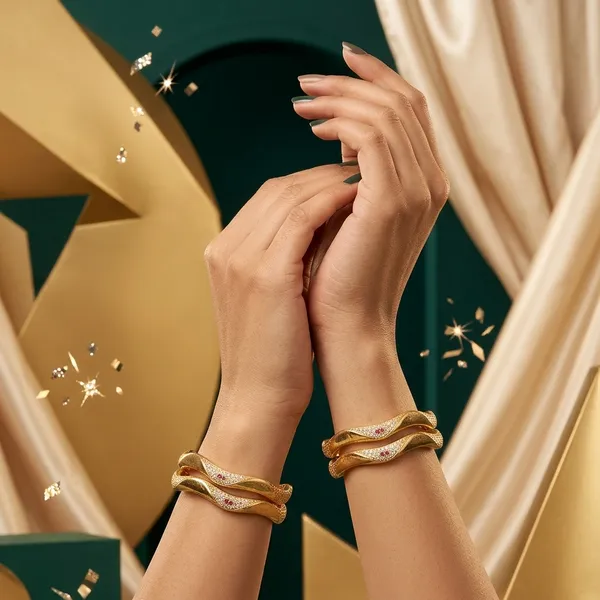 The_Aurelia_Wave_Bangle_Set_(Set_of_2)_�_Gold_Textured_Kada_with_CZ_&_Ruby_Accents