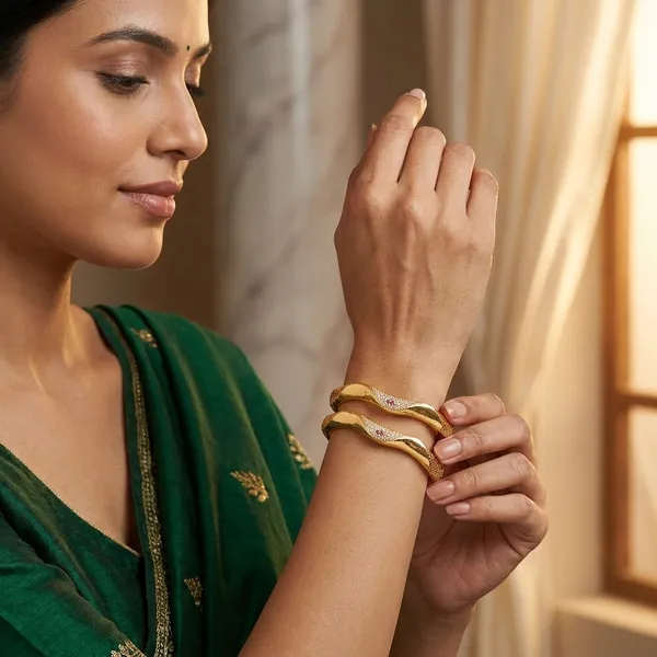 The_Aurelia_Wave_Bangle_Set_(Set_of_2)_�_Gold_Textured_Kada_with_CZ_&_Ruby_Accents
