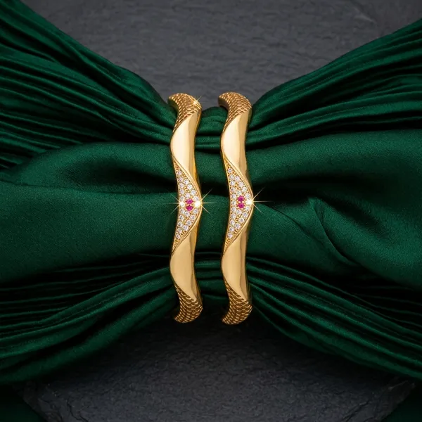 The_Aurelia_Wave_Bangle_Set_(Set_of_2)_�_Gold_Textured_Kada_with_CZ_&_Ruby_Accents