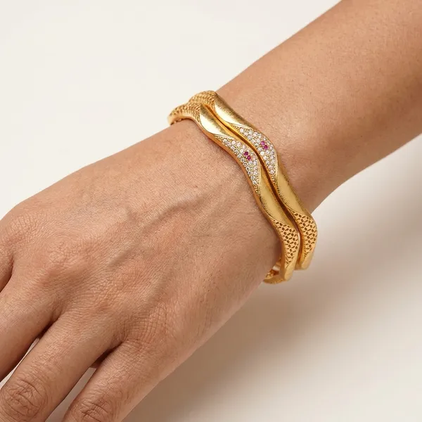 The_Aurelia_Wave_Bangle_Set_(Set_of_2)_�_Gold_Textured_Kada_with_CZ_&_Ruby_Accents