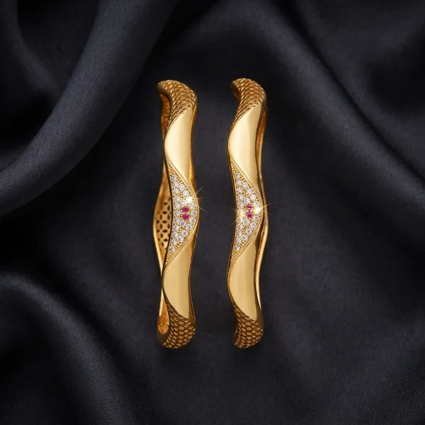 The_Aurelia_Wave_Bangle_Set_(Set_of_2)_�_Gold_Textured_Kada_with_CZ_&_Ruby_Accents