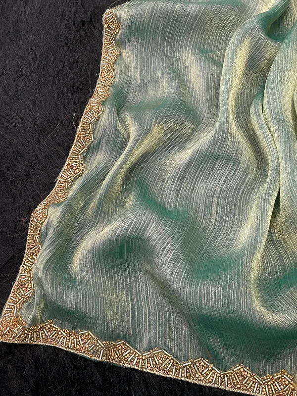 Green_Solid_Saree_With_Embellished_Border_For_Women_With_Blouse