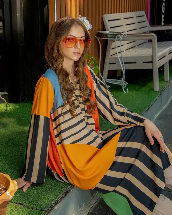 Modern_Striped_&_Colorblock_Long_Top_With_Beige_Pants