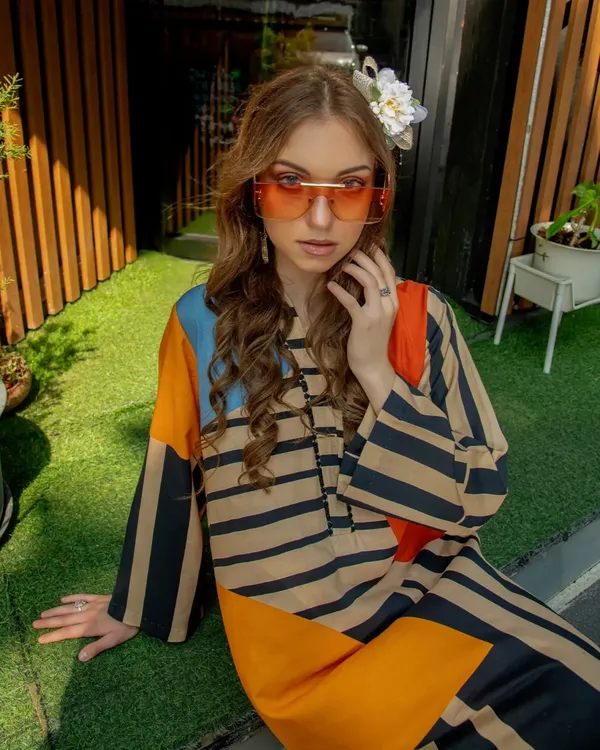 Modern_Striped_&_Colorblock_Long_Top_With_Beige_Pants