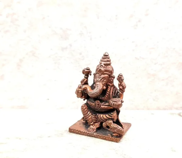 Brownish-Orange_Copper_Idols,_3.8_Cm,_Handmade_Little_Ganesh_40Grams,_Patina_Antique_Finish,_Pack_Of_1_Piece