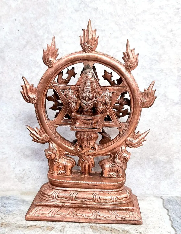 Brownish_Orange_Copper_Idol_Of_God_Chakrathualwar,_6.8_Inches,_1.3_Kg,_Patina_Antique_Finish,_Pack_Of_1_Piece,_For_Home_Pooja.
