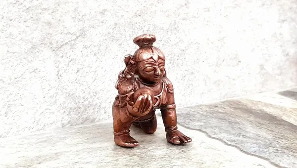 Brownish-Orange_Copper_Idols_Of_God_Bal_Krishna_With_Laddu_By_Searchers_Paradise,_1.6_Inches,_55G,_Patina_Antique_Finish,_Pack_Of_1_Piece