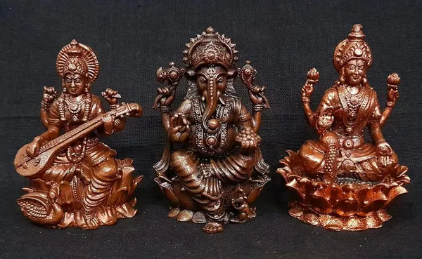 Brown_Copper_Idols_Of_Ganesh,_Lakshmi_And_Saraswathi_Combo,_2.8_Inch_615_Gram,_Pack_Of_3_Piece