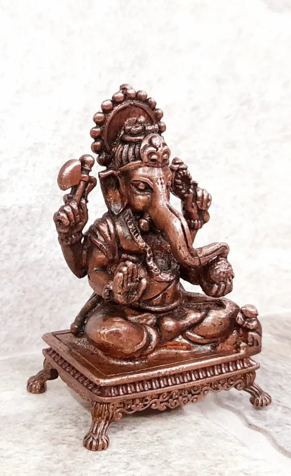 Brownish-Orange_Copper_Idols,_2.4_Inches,_Handmade_Ganesh,_115G,_Patina_Antique_Finish,_Pack_Of_1_Piece