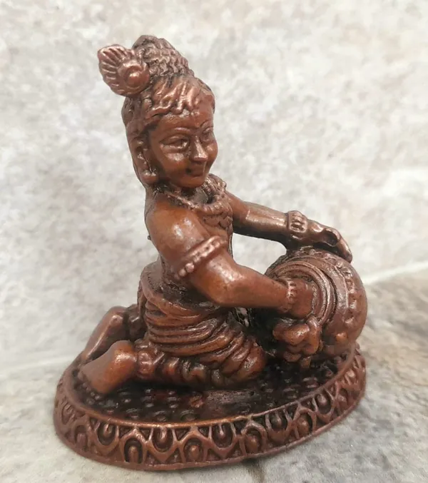 Brownish-Orange_Copper_Idols_India,_1.8_Inches,_Sri_Krishna_Culture_Krishna_Idol_Sitting_And_Stealing_Butter,_85G,_Patina_Antique_Finish,_Pack_Of_1_Piece