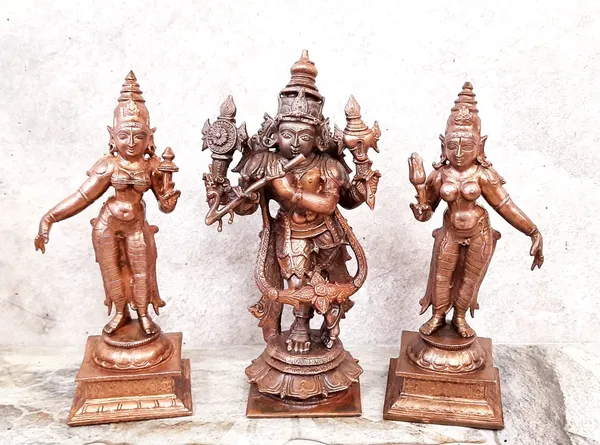 Brownish-Orange_Copper_Idols_Of_God_Venugopala_Swamy_With_Sridevi_And_Bhudevi,_5.7_Inches,_1.5_Kg,_Patina_Antique_Finish,_Pack_Of_3_Piece