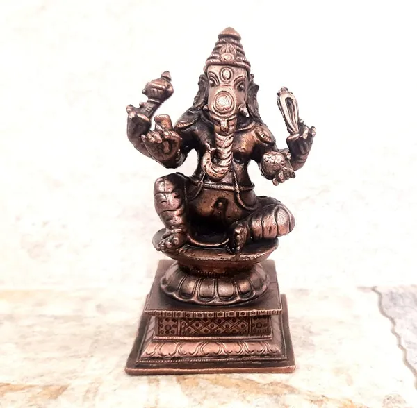 Brownish-Orange_Copper_Idols_India,_4.2_Inches,_Handmade_Ganesh_640_Gram,_Patina_Antique_Finish,_Pack_Of_1_Piece