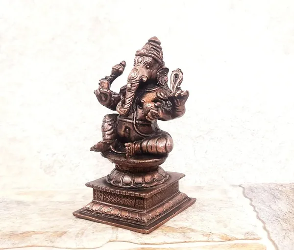Brownish-Orange_Copper_Idols_India,_4.2_Inches,_Handmade_Ganesh_640_Gram,_Patina_Antique_Finish,_Pack_Of_1_Piece