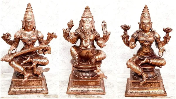 Brownish-Orange_Copper_Idols_Of_God_Ganesh,_Lakshmi_And_Saraswathi_Combo,_4_Inch_Patina_Antique_Finish,_Pack_Of_3_Piece