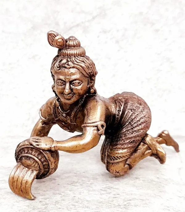 Brownish-Orange_Copper_Idols_India,_1.5_Inches,_Sri_Krishna_Culture_Krishna_Idol_With_Butter_Pot,_60G,_Patina_Antique_Finish,_Pack_Of_1_Piece