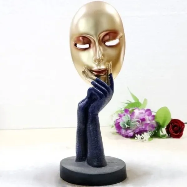 Modern_Art_Golden_Face_Sculpture_with_Blue_Hands_â€“_Abstract_Decor_Piece