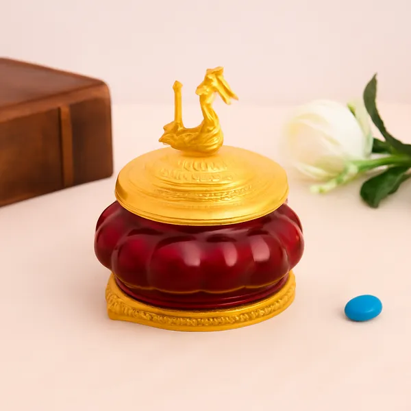Elegant_Turquoise_Glass_Container_with_Gold_Accents
