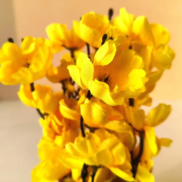 Artificial_Yellow_Flower_Arrangement_in_White_Pot