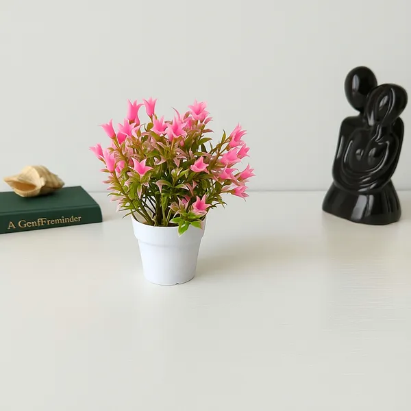 Beautiful_Pink_Floral_Display_with_Green_Leaves_in_a_White_Pot