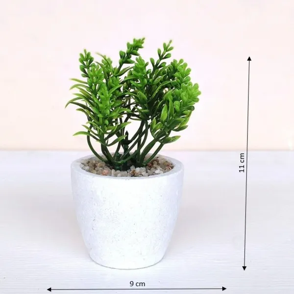 Elegant_Artificial_Green_Plant_Arrangement_in_a_White_Finish_Pot_with_Decorative_Pebbles