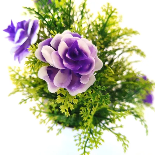 Exquisite_Artificial_Purple_Floral_Arrangement_with_Delicate_White_Accents_in_a_Sleek_White_Plastic_Pot