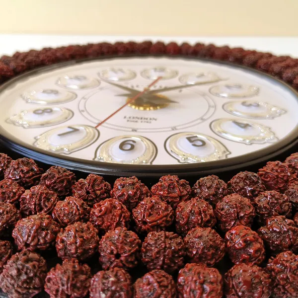 Handcrafted_Decorative_Wall_Clock_â€“_Rudraksha_Bead_Design