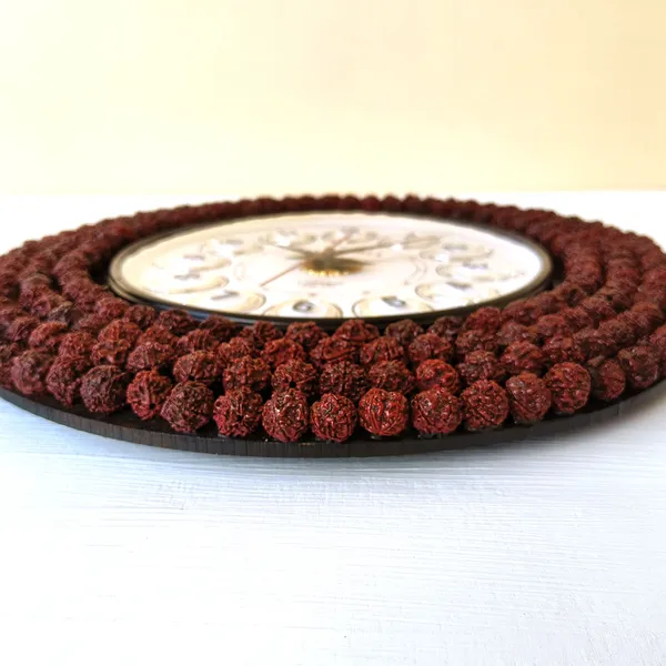 Handcrafted_Decorative_Wall_Clock_â€“_Rudraksha_Bead_Design