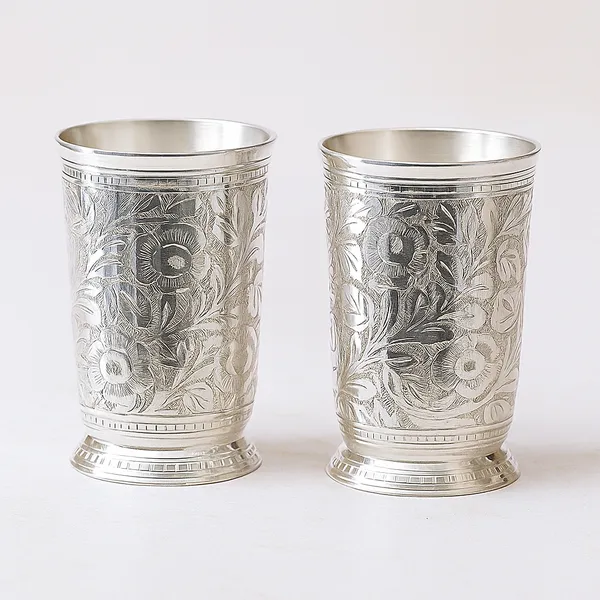 Luxury_Handcrafted_Silver_Floral_Embossed_Cups_with_Intricate_Patterns_and_Elegant_Design