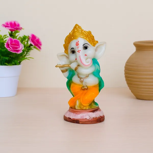 Vibrant_Hand-Painted__Lord_Ganesha_Statue_Playing_Flute_with_Golden_Crown,_Green_Shawl,_and_Orange_Dhoti