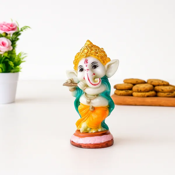 Vibrant_Hand-Painted__Lord_Ganesha_Statue_Playing_Flute_with_Golden_Crown,_Green_Shawl,_and_Orange_Dhoti