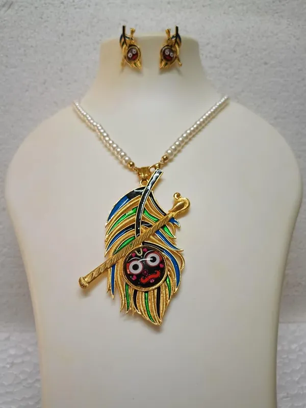 Lord_Jagannath_On_Peacock_Feather_Pendant_Pearl_Necklace_Set_Matching_Earrings_Included_Gold_Tone_Finish_Enamel_Detailing_Pearl_Chain_Devotional_Jewellery