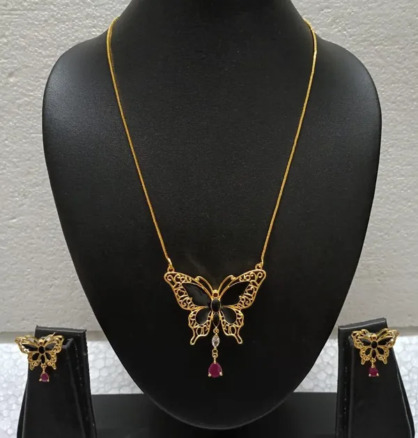Purabi_Jewels_Valentine_Gift_Girlfriend_Wife_Gold_Plated_Crystal_Stone_Butterfly_Designer_Earrings_Chain_Pendant_Necklace_Combo_Jewellery_Set_For_Women_And_Girls_(Black)