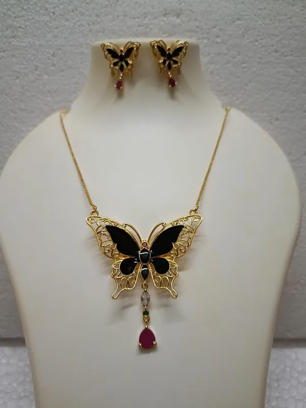 Purabi_Jewels_Valentine_Gift_Girlfriend_Wife_Gold_Plated_Crystal_Stone_Butterfly_Designer_Earrings_Chain_Pendant_Necklace_Combo_Jewellery_Set_For_Women_And_Girls_(Black)