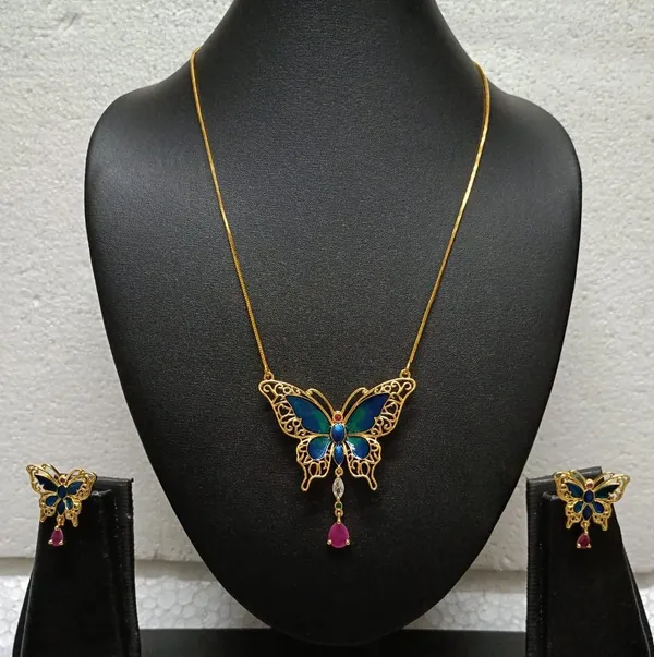 Purabi_Jewels_Valentine_Gift_Girlfriend_Wife_Gold_Plated_Crystal_Stone_Butterfly_Designer_Earrings_Chain_Pendant_Necklace_Combo_Jewellery_Set_For_Women_And_Girls_(Blue)