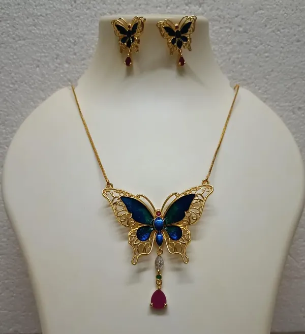 Purabi_Jewels_Valentine_Gift_Girlfriend_Wife_Gold_Plated_Crystal_Stone_Butterfly_Designer_Earrings_Chain_Pendant_Necklace_Combo_Jewellery_Set_For_Women_And_Girls_(Blue)