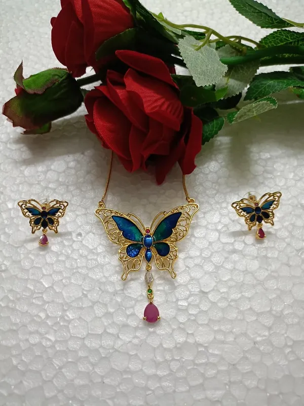 Purabi_Jewels_Valentine_Gift_Girlfriend_Wife_Gold_Plated_Crystal_Stone_Butterfly_Designer_Earrings_Chain_Pendant_Necklace_Combo_Jewellery_Set_For_Women_And_Girls_(Blue)