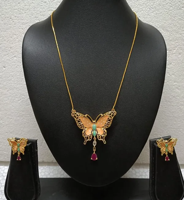 Purabi_Jewels_Valentine_Gift_Girlfriend_Wife_Gold_Plated_Crystal_Stone_Butterfly_Designer_Earrings_Chain_Pendant_Necklace_Combo_Jewellery_Set_For_Women_And_Girls_(Beige)