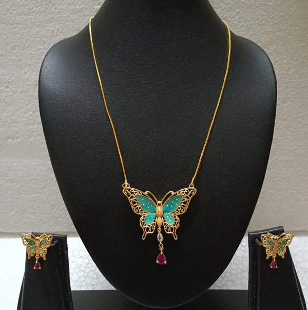 Purabi_Jewels_Valentine_Gift_Girlfriend_Wife_Gold_Plated_Crystal_Stone_Butterfly_Designer_Earrings_Chain_Pendant_Necklace_Combo_Jewellery_Set_For_Women_And_Girls_(Green)