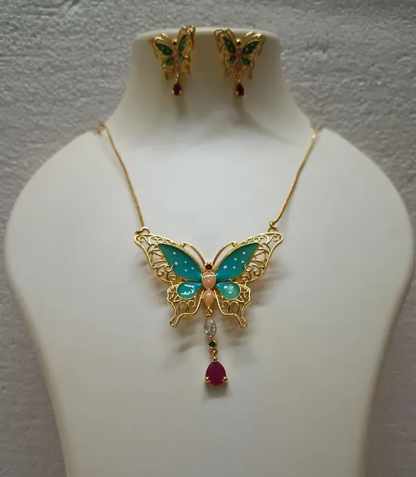 Purabi_Jewels_Valentine_Gift_Girlfriend_Wife_Gold_Plated_Crystal_Stone_Butterfly_Designer_Earrings_Chain_Pendant_Necklace_Combo_Jewellery_Set_For_Women_And_Girls_(Green)