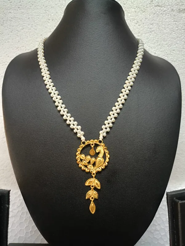 Purabi_Jewels_Traditional_Gold_Plated_Pendant_Pearl_Necklace_For_Women_Multi_Strand_White_Pearl_Mala_With_Engraved_Leaf_Gold_Pendant_And_Dangles