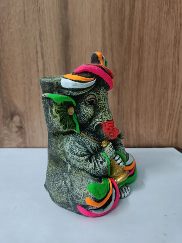 Handcrafted_Lord_Ganesha_with_Flute_Decorative_Flower_Pot_/_Pen_Stand