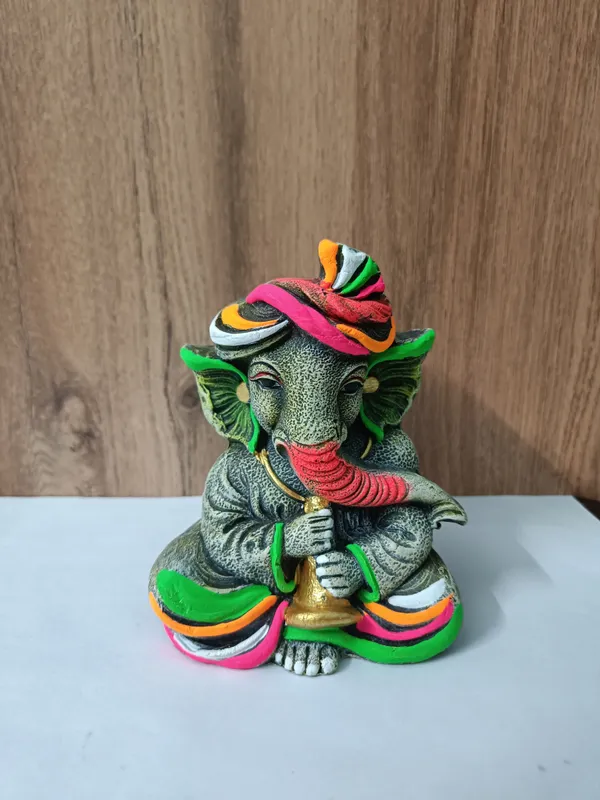 Handcrafted_Lord_Ganesha_with_Flute_Decorative_Flower_Pot_/_Pen_Stand