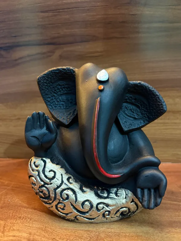 Set_of_4_Black_Ganesha_Idols_–_Decorative_Sitting_Ganesh_Figurines_for_Home_&_Office